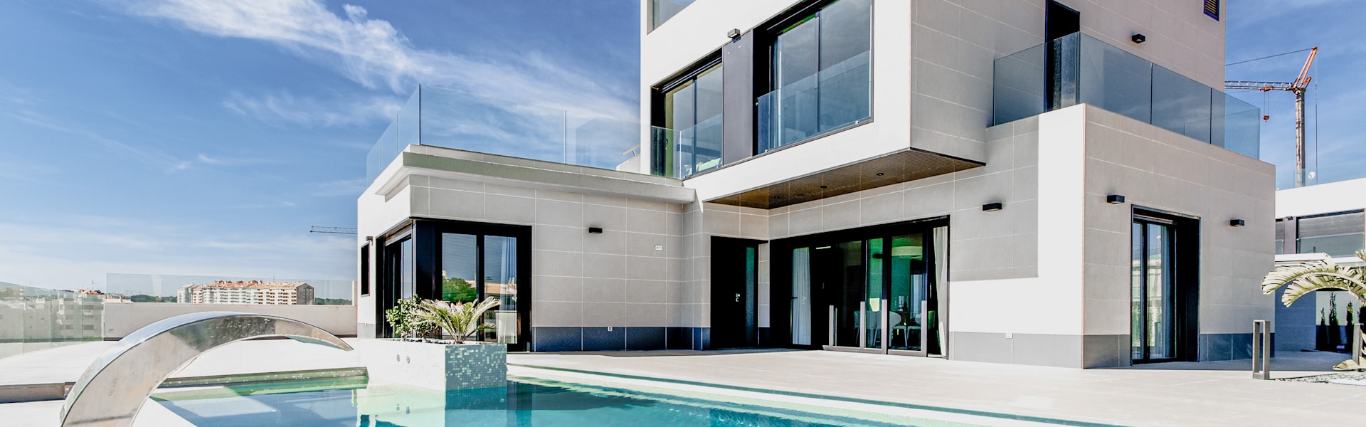 Pinova real estate website builder: Luxury modern home aerial view